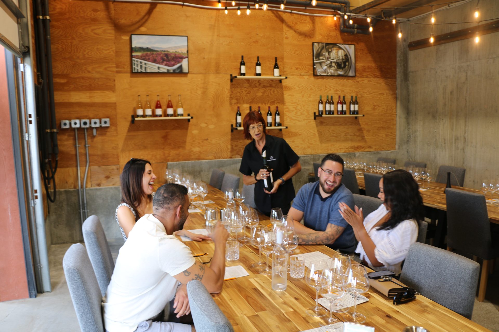 Bubbles Don't Count guests enjoying a barrel room tasting at Wesbert Winery.